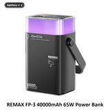 Close-up of the 65W fast-charging ports and LED interface on the REMAX FP-3