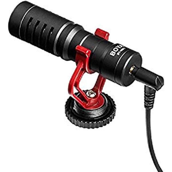 Original BOYA BY-MM1 cardioid microphone showing its compact aluminum body, custom anti-shock mount, furry windshield, and 3.5mm TRS/TRRS cables