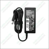 Dell 90W slim laptop charger showing the adapter unit, 7.4x5.0mm barrel pin tip, and high-performance power brick design