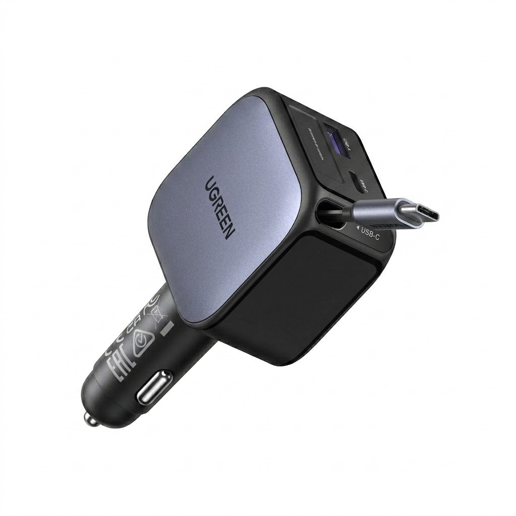 UGREEN Nexode 60W 2C1A car charger with integrated retractable USB-C cable plugged into a dashboard socket