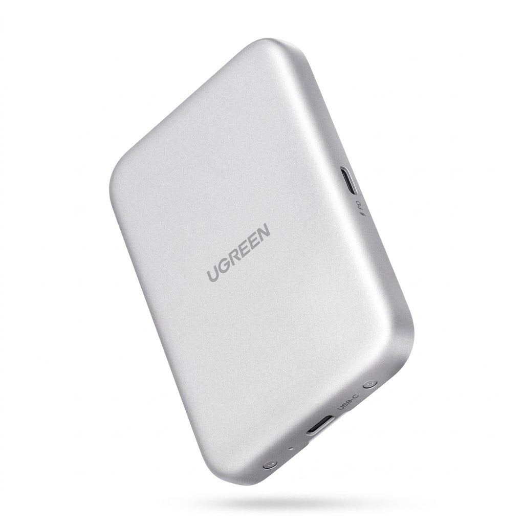UGREEN D619 MagSafe magnetic M.2 NVMe USB-C 10Gbps portable external SSD enclosure hard drive box attached to a phone.