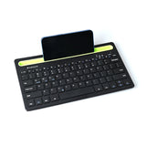 Wireless Bluetooth keyboard with integrated phone and tablet holder slot, featuring a 78-key layout and universal compatibility